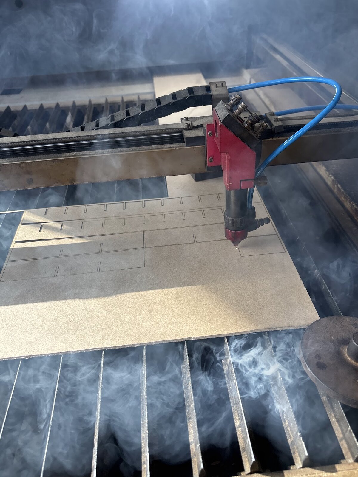 Photograph of the assembled tower panel, matching the laser-cut layout