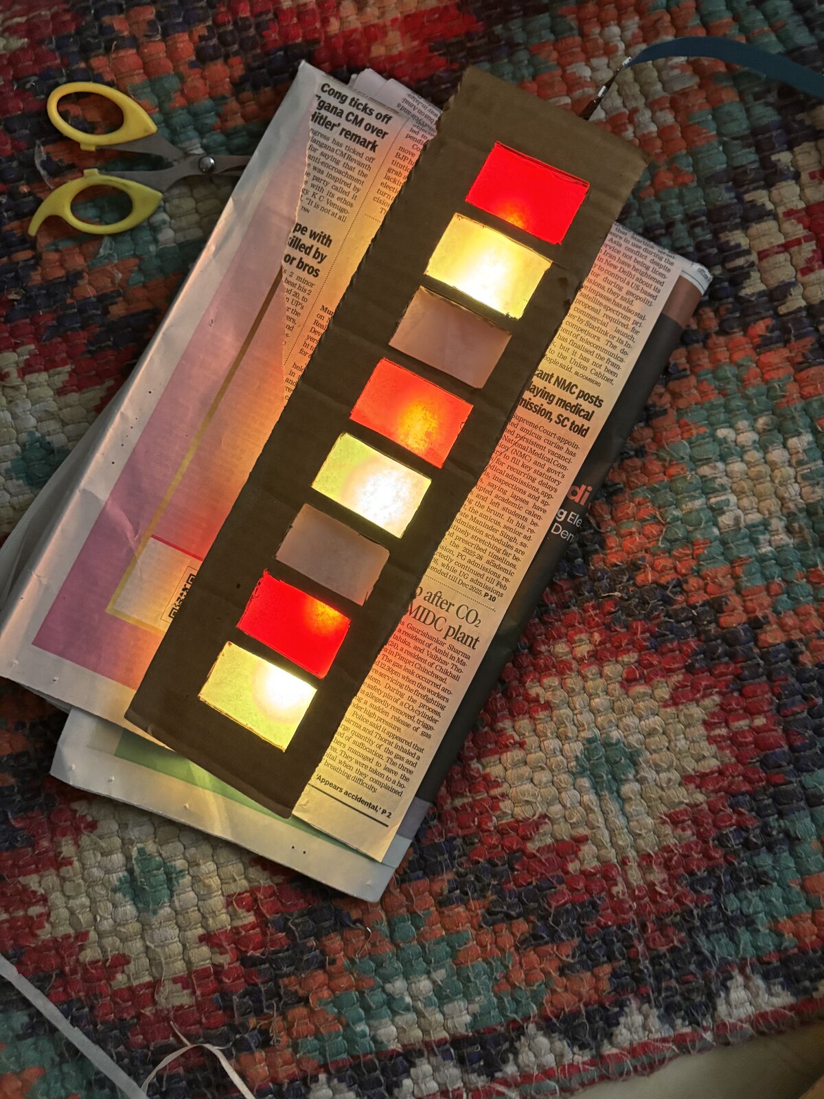 One vertical strip of the laser-cut assembly showing a column of windows